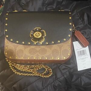 Coach Black and Tan Crossbody Bag with Floral Clasp Brand New w/ tags